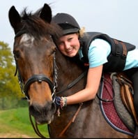 girl hugging horse RegentInsuranceGroup